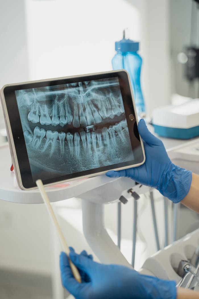 Inicio 2 a patient dental x ray on a tablet screen 5355695